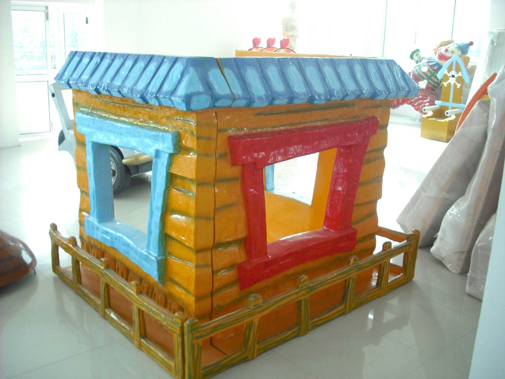 Colourful playhouse with a roof and windows